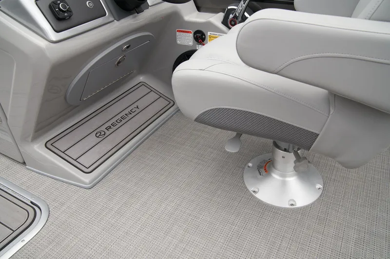 Slide: The Image of Interior of 2025 Regency 230 LE3 Sport with gray seat and flooring. - 45
