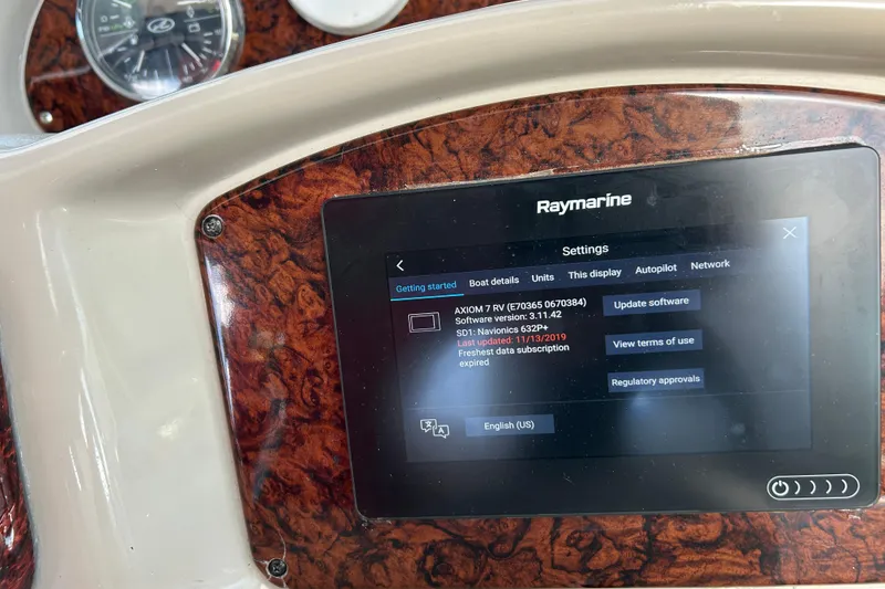 Slide: The Image of Raymarine display on 2006 Sea Ray 320 Sundancer showing software settings and updates. - 20