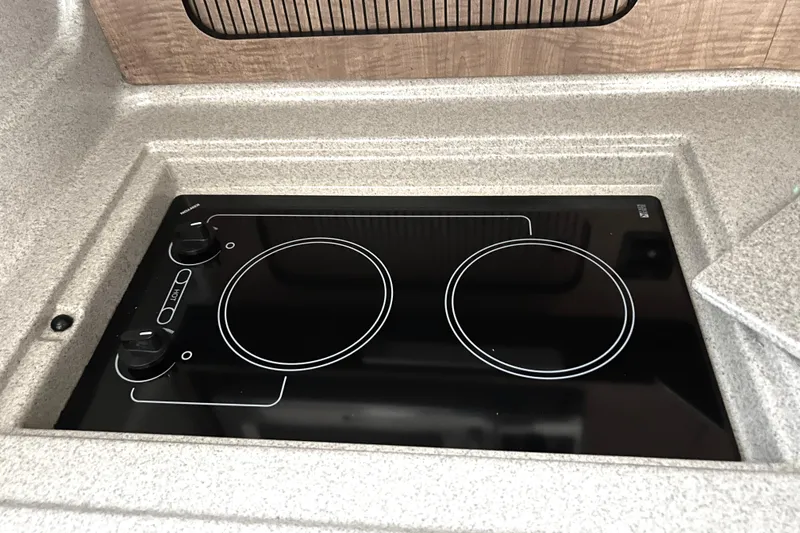 Slide: The Image of Built-in stovetop on 2006 Sea Ray 320 Sundancer yacht kitchen. - 29