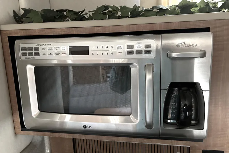 Slide: The Image of LG microwave and coffee maker combo in 2006 Sea Ray 320 Sundancer yacht. - 33