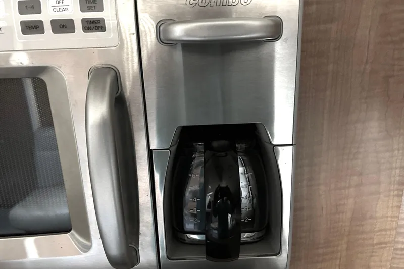 Slide: The Image of Built-in coffee maker on a Sea Ray 320 Sundancer yacht, 2006 model. - 34