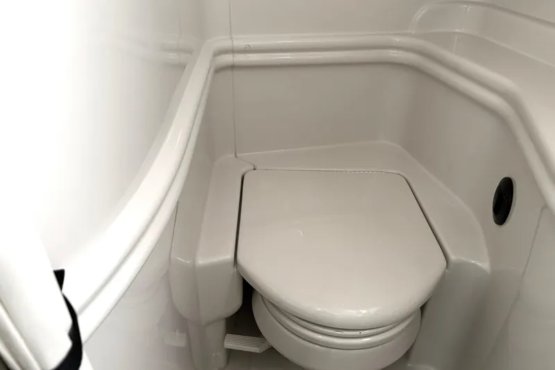 Slide: The Image of Compact marine toilet in 2006 Sea Ray 320 Sundancer boat bathroom. - 37