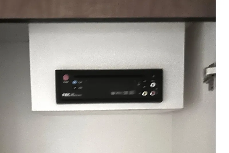 Slide: The Image of Control panel inside 2006 Sea Ray 320 Sundancer boat cabin. - 59