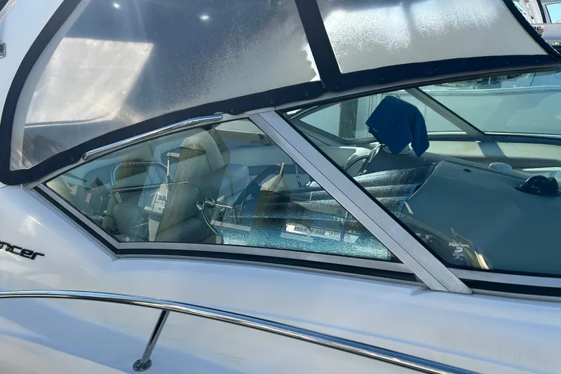 Slide: The Image of 2006 Sea Ray 320 Sundancer boat interior view through window. - 7