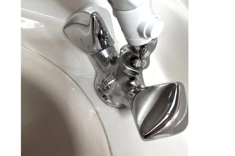 Slide: The Image of Chrome faucet on 2006 Sea Ray 320 Sundancer boat sink. - 70