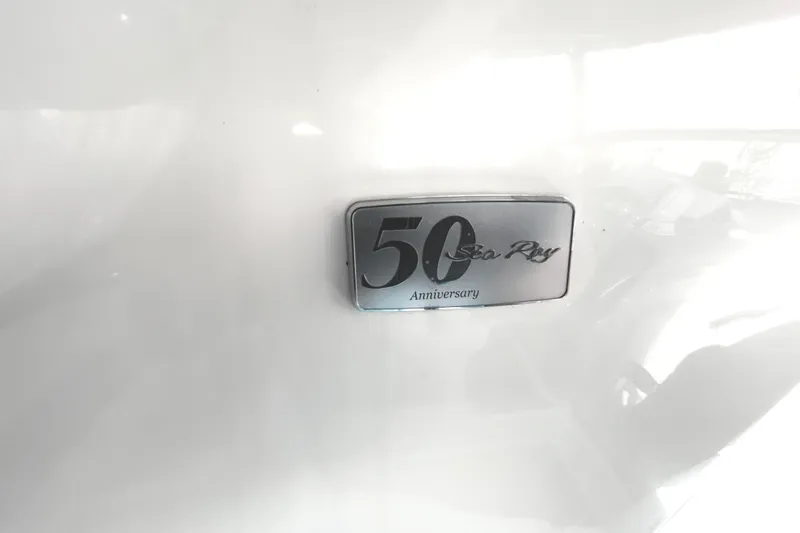Slide: The Image of 50th Anniversary badge on 2006 Sea Ray 320 Sundancer boat. - 73