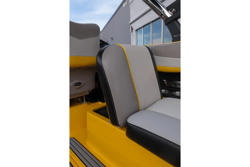 Slide: The Image of 2014 Malibu Wakesetter 24 MXZ boat seat with yellow and gray upholstery. - 22