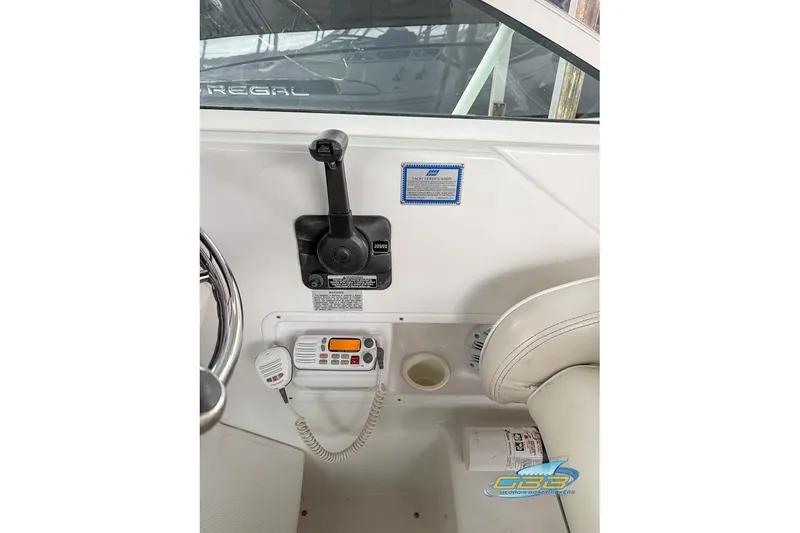 Slide: The Image of Interior of 2001 Chris-Craft 26 Constellation boat with control panel and radio. - 18