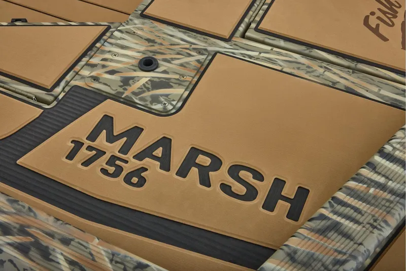Slide: The Image of Tracker Grizzly 1756 T Marsh 2026 boat deck with camouflage pattern. - 42