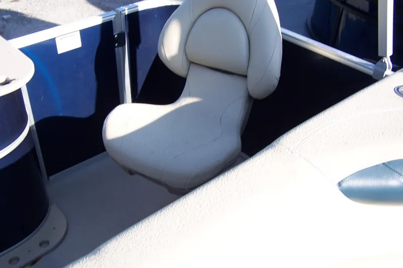 Slide: The Image of 2019 Sylvan 8520 Mirage F-n-C boat interior with beige seating. - 4