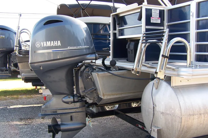 Slide: The Image of 2019 Sylvan 8520 Mirage F-n-C pontoon boat with Yamaha four-stroke outboard motor. - 8