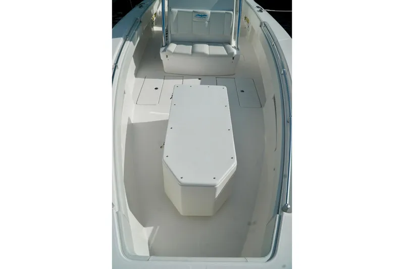 Slide: The Image of Invincible boat interior with seating and storage, featuring a clean, spacious design. - 16