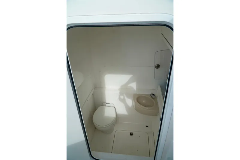 Slide: The Image of Compact boat bathroom with toilet and sink, Invincible make. - 38