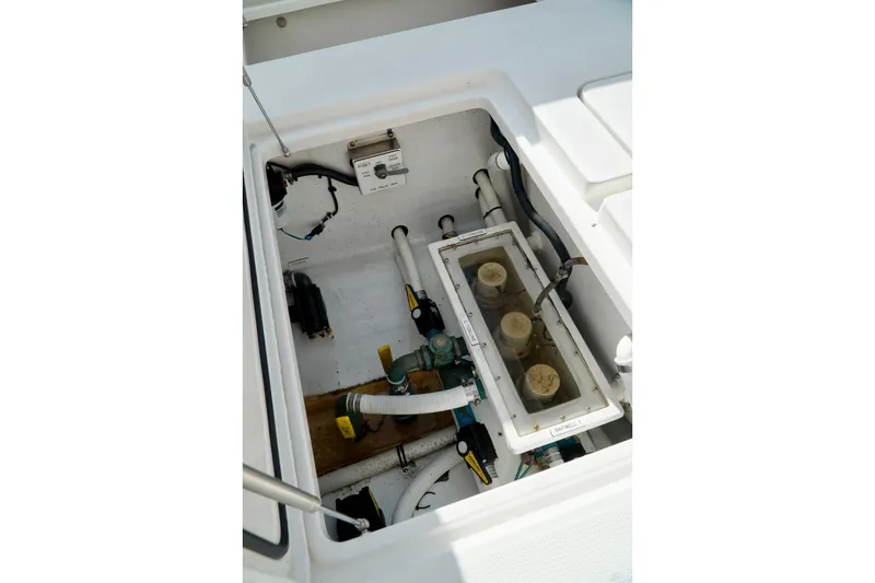 Slide: The Image of Boat compartment with plumbing and electrical components, Invincible make. - 72