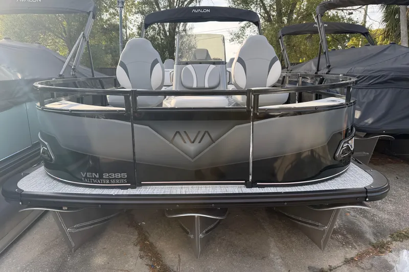 Slide: The Image of 2026 Avalon VENTURE CC pontoon boat, VEN 2385 Saltwater Series, sleek design, outdoor setting. - 5