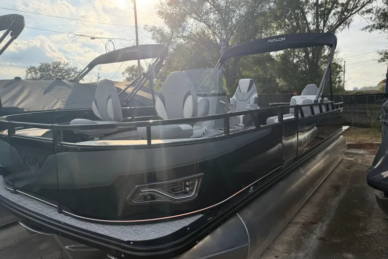 Slide: The Image of 2026 Avalon VENTURE CC pontoon boat with sleek design and modern seating. - 6