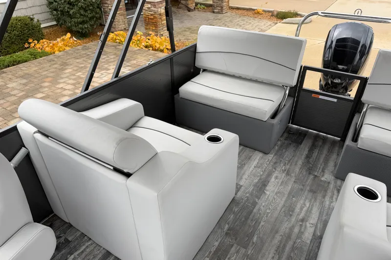 Slide: The Image of 2019 Crest I SLRC boat interior with gray seating and modern design. - 12