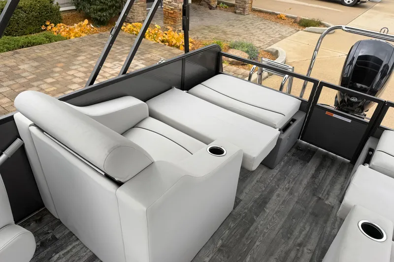 Slide: The Image of 2019 Crest I SLRC boat interior with gray seating and cup holders. - 14