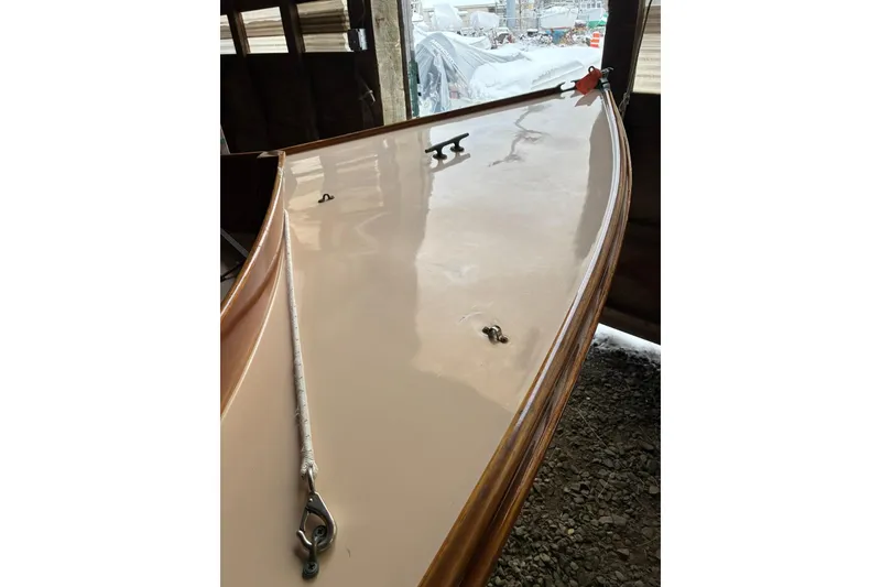 Slide: The Image of 1981 Herreshoff Doughdish 12.5 footer sailboat, detailed view of deck and fittings. - 2