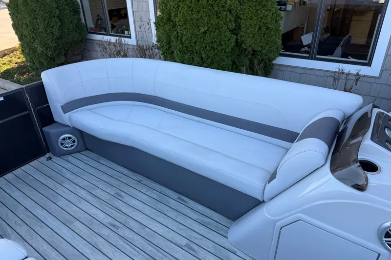 Slide: The Image of 2017 Crest I 220 SLC boat interior with sleek seating and modern design. - 13