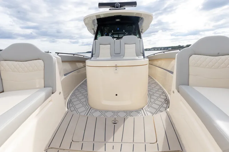 Slide: The Image of 2024 Scout 377 LXF boat interior with luxurious seating and modern design. - 46