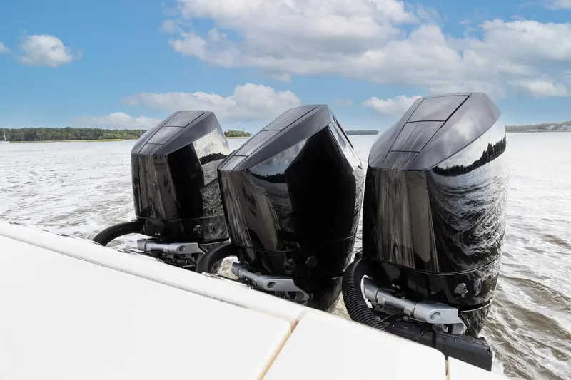 Slide: The Image of Triple MERCURY V-10 400 HP Outboards with Custom Mohawk paint upgrade on a 2024 Scout 377 LXF boat - 67