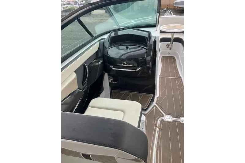 Slide: The Image of 2024 Monterey 258SS Super Sport boat interior with sleek seating and modern dashboard design. - 5