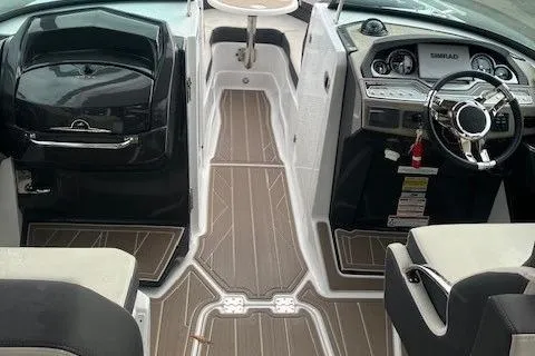 Slide: The Image of 2024 Monterey 258SS Super Sport boat interior with modern dashboard and seating. - 6