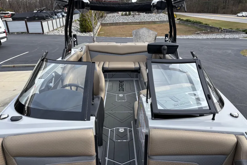 Slide: The Image of 2026 Supreme S240 boat interior with sleek seating and modern dashboard design. - 11