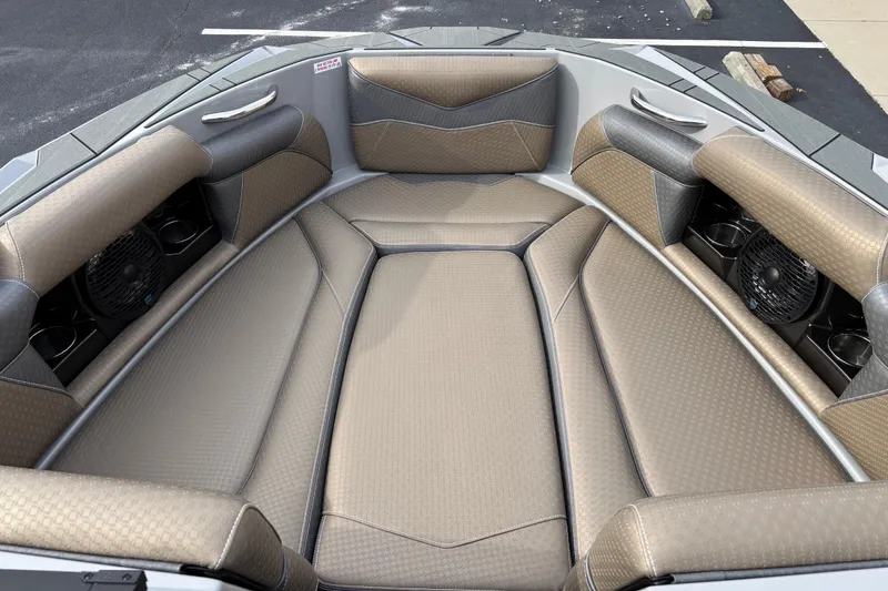 Slide: The Image of Interior of 2026 Supreme S240 boat with luxurious seating and built-in speakers. - 7