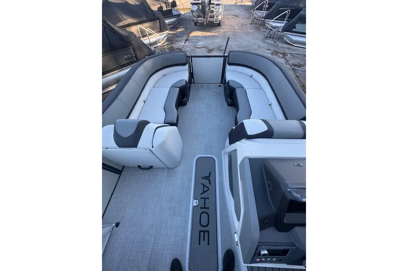 Slide: The Image of 2026 Tahoe Pontoon CASCADE QUAD LOUNGER interior with spacious seating and modern design. - 4