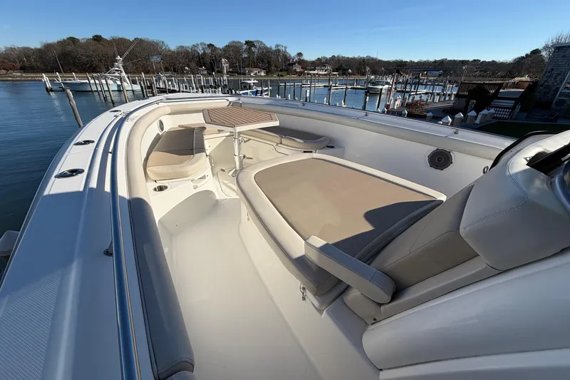 Slide: The Image of 2017 Boston Whaler 350 Outrage boat interior with storage compartments. - 28