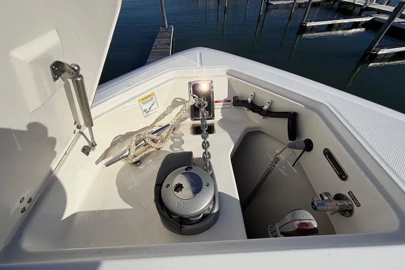 Slide: The Image of 2017 Boston Whaler 350 Outrage boat interior with seating and table. - 33