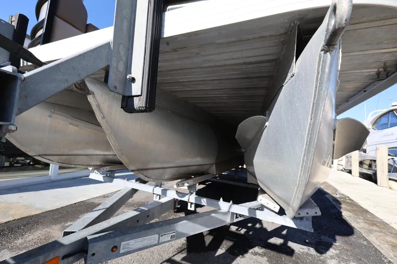 Slide: The Image of 2019 Veranda 22 VR pontoon boat on trailer, close-up view of pontoons. - 9