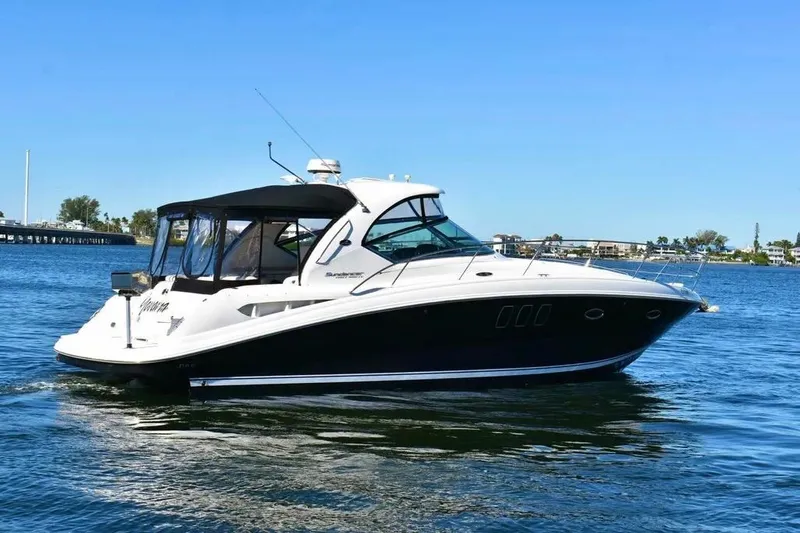 Slide: The Image of 2010 Sea Ray 390 Sundancer yacht cruising on a sunny day. - 4