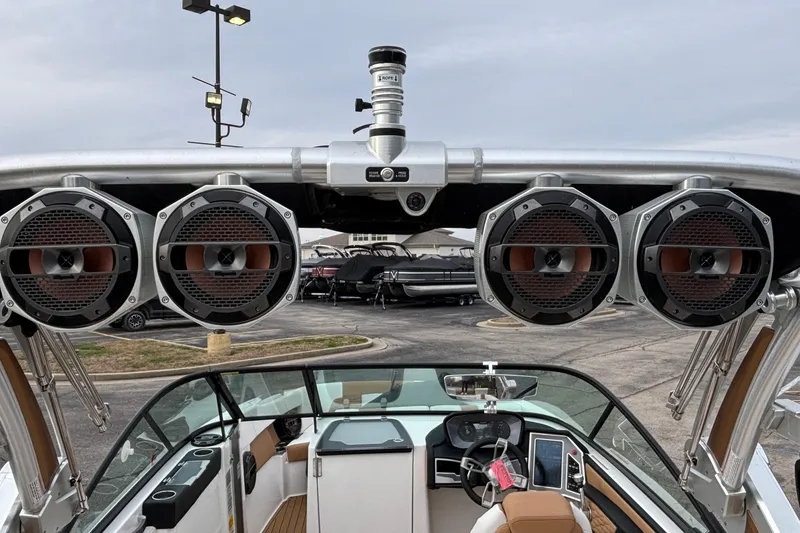 Slide: The Image of 2022 MasterCraft X26 boat with premium audio system and modern dashboard. - 50