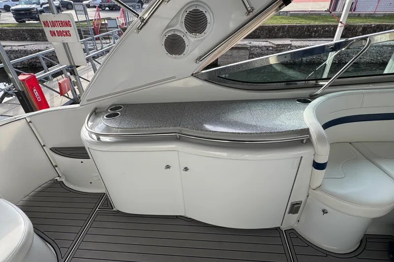 Slide: The Image of 2005 Formula 400 Super Sport boat interior with seating and countertop. - 13