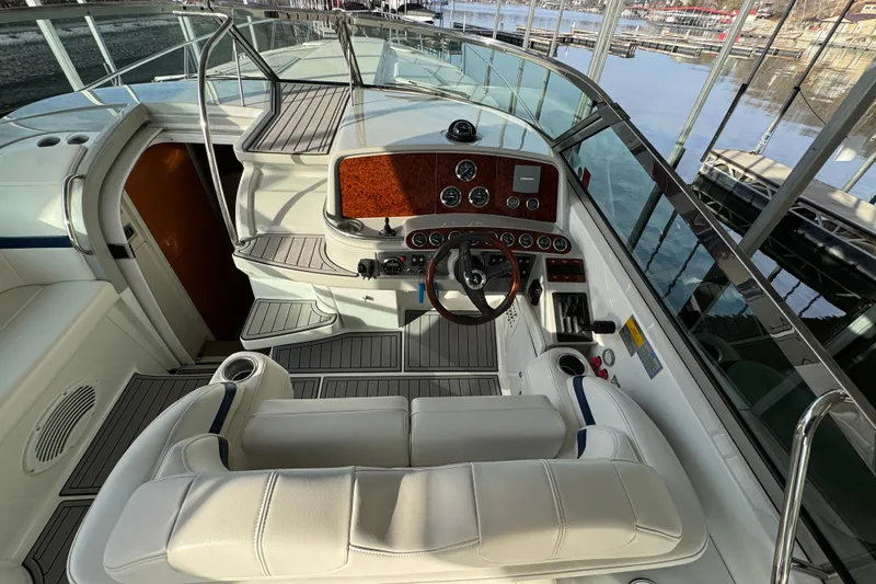 Slide: The Image of 2005 Formula 400 Super Sport boat cockpit with luxurious seating and control panel. - 17