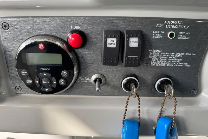 Slide: The Image of Control panel of a 2005 Formula 400 Super Sport boat with Clarion audio system. - 26