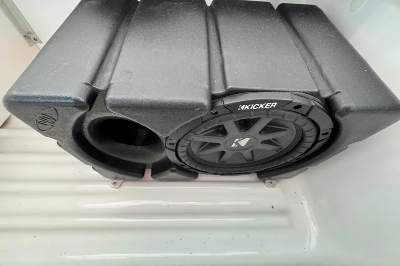 Slide: The Image of Kicker subwoofer installed in a 2005 Formula 400 Super Sport boat. - 30