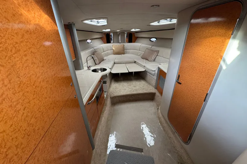 Slide: The Image of Luxurious interior of a 2005 Formula 400 Super Sport yacht with plush seating and wood accents. - 33