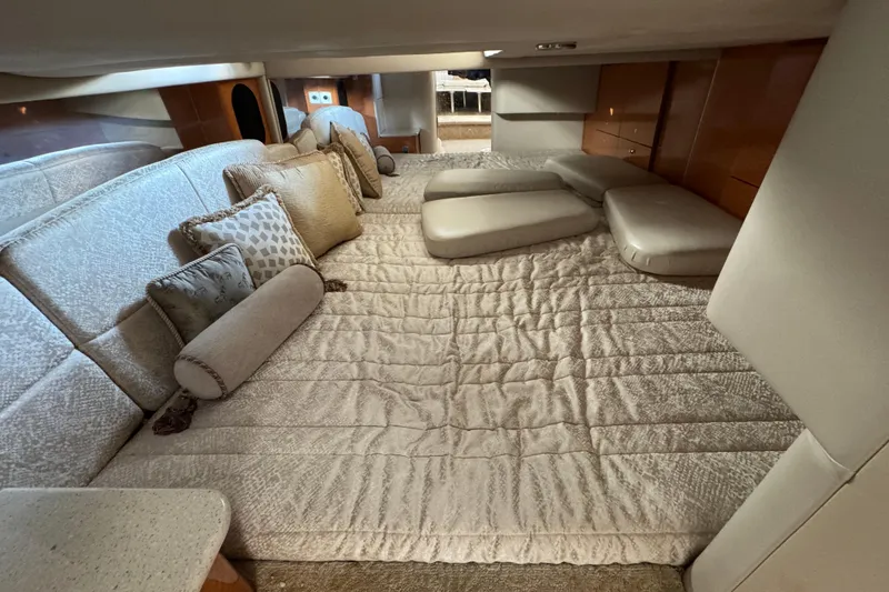 Slide: The Image of Luxurious interior of a 2005 Formula 400 Super Sport yacht with plush bedding and cushions. - 45