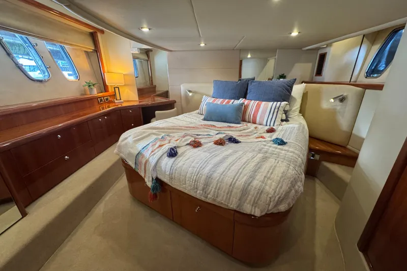 Slide: The Image of Luxurious bedroom interior of 2006 Sunseeker Manhattan 50 yacht with elegant decor. - 18