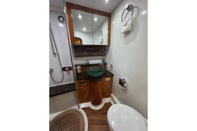 Slide: The Image of Luxurious bathroom in 2006 Sunseeker Manhattan 50 yacht with modern fixtures and elegant design. - 19