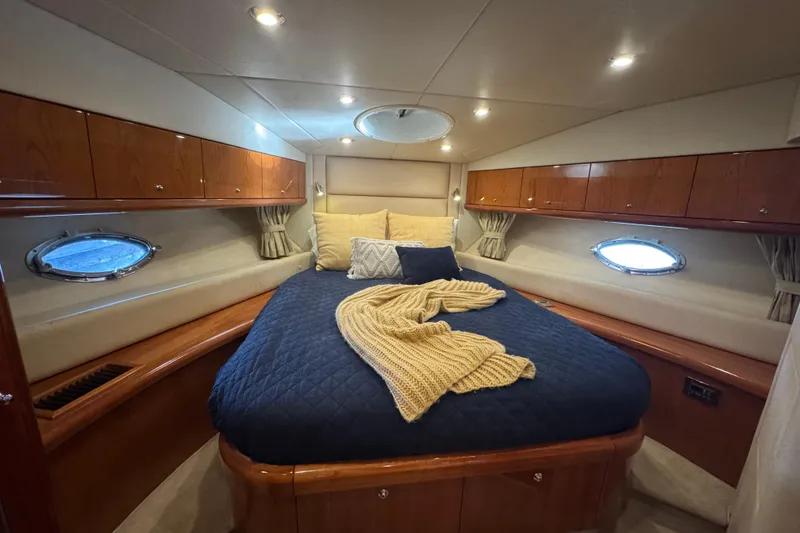 Slide: The Image of Luxurious cabin interior of 2006 Sunseeker Manhattan 50 yacht with cozy bedding. - 20