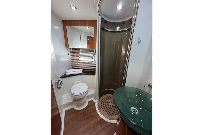 Slide: The Image of Luxurious bathroom in 2006 Sunseeker Manhattan 50 yacht with modern fixtures and elegant design. - 21