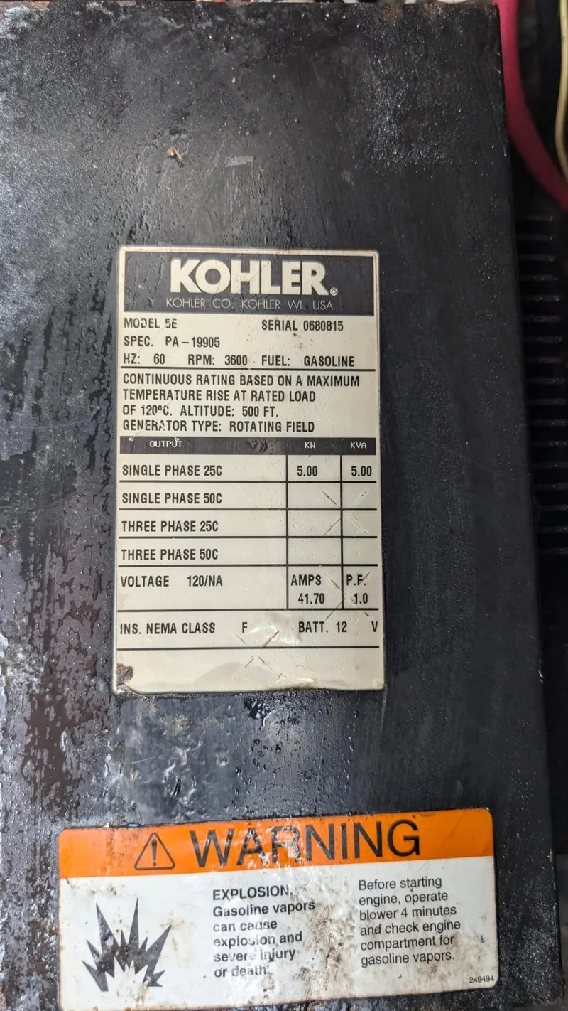 Slide: The Image of Kohler generator label on a 2001 Wellcraft 270 Coastal O/B boat. - 14
