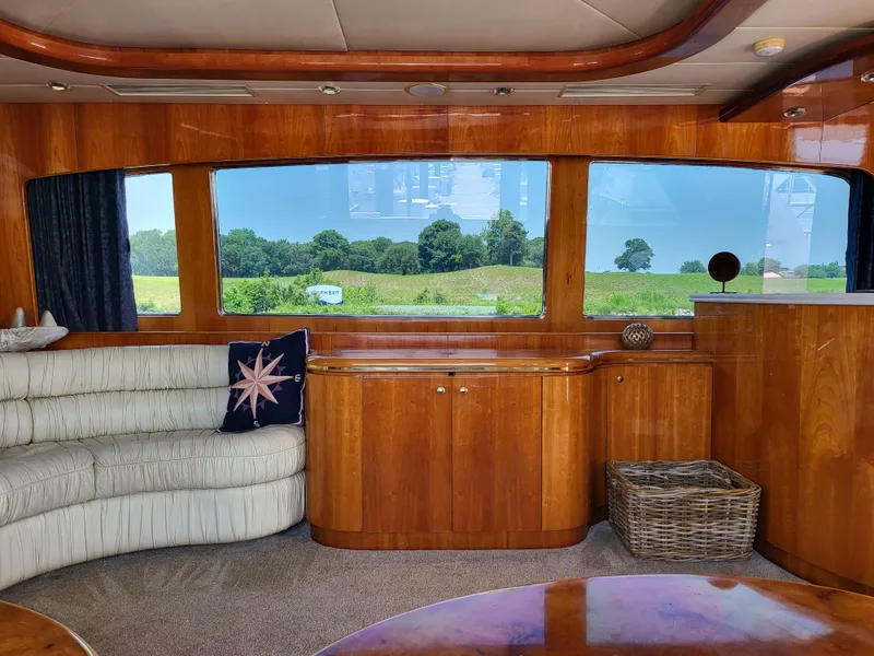 Slide: The Image of Luxurious interior of 2000 Horizon 74 Motor Yacht with scenic window view. - 17