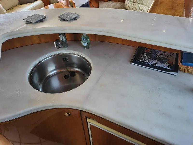 Slide: The Image of Luxurious yacht interior with marble countertop and sink, Horizon 74 Motor Yacht, 2000 model. - 22