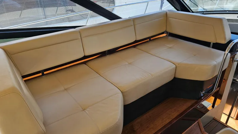 Slide: The Image of Luxurious beige seating on 2016 Sea Ray 470 Sundancer yacht. - 16